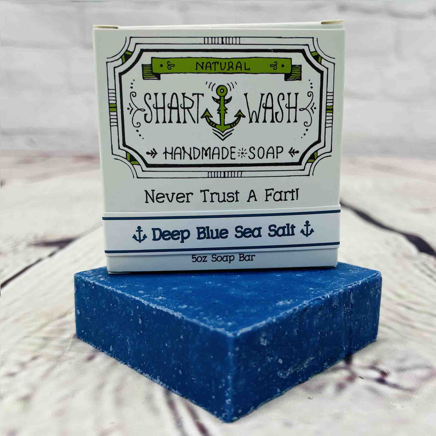 Picture of Shart Wash Handmade Soap Bars Deep Blue Sea Salt Scent box on top of a blue bar of soap