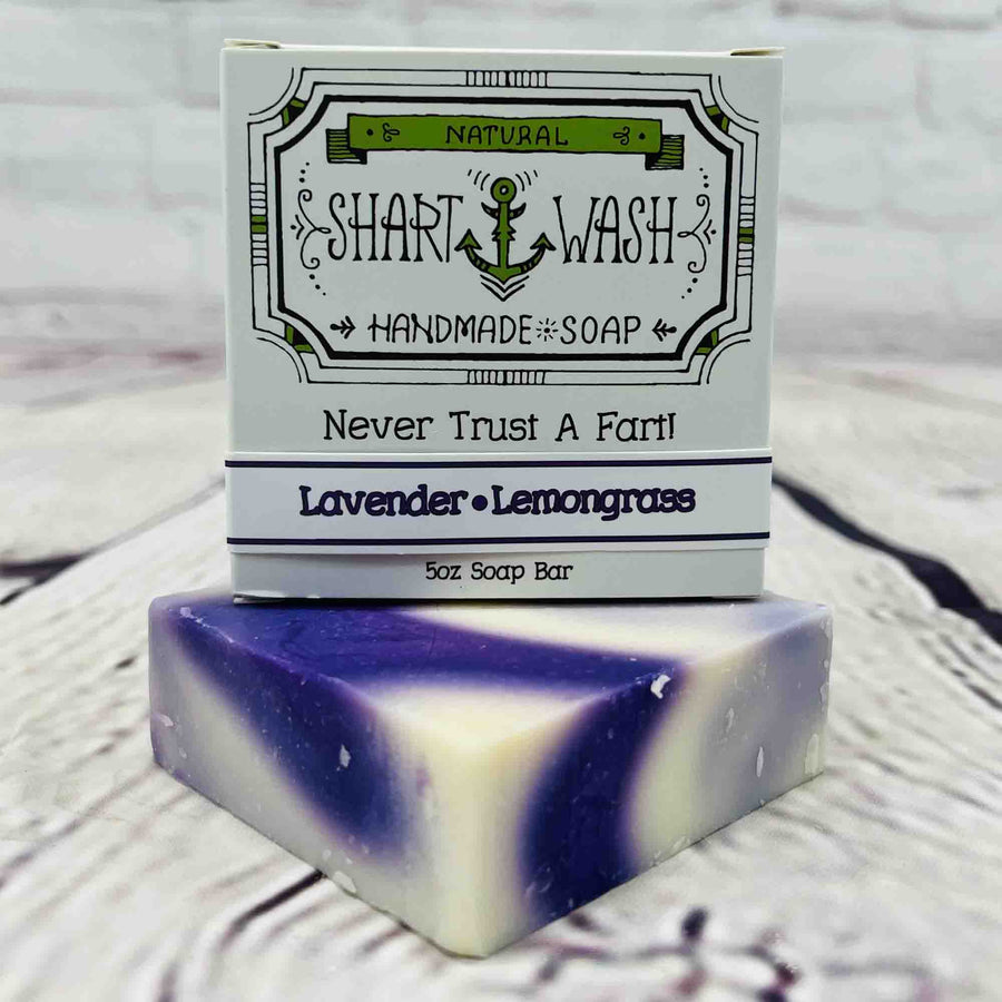 Picture of Shart Wash Handmade Soap Bars Lavender Lemongrass Scent box on top of a purple and white bar of soap