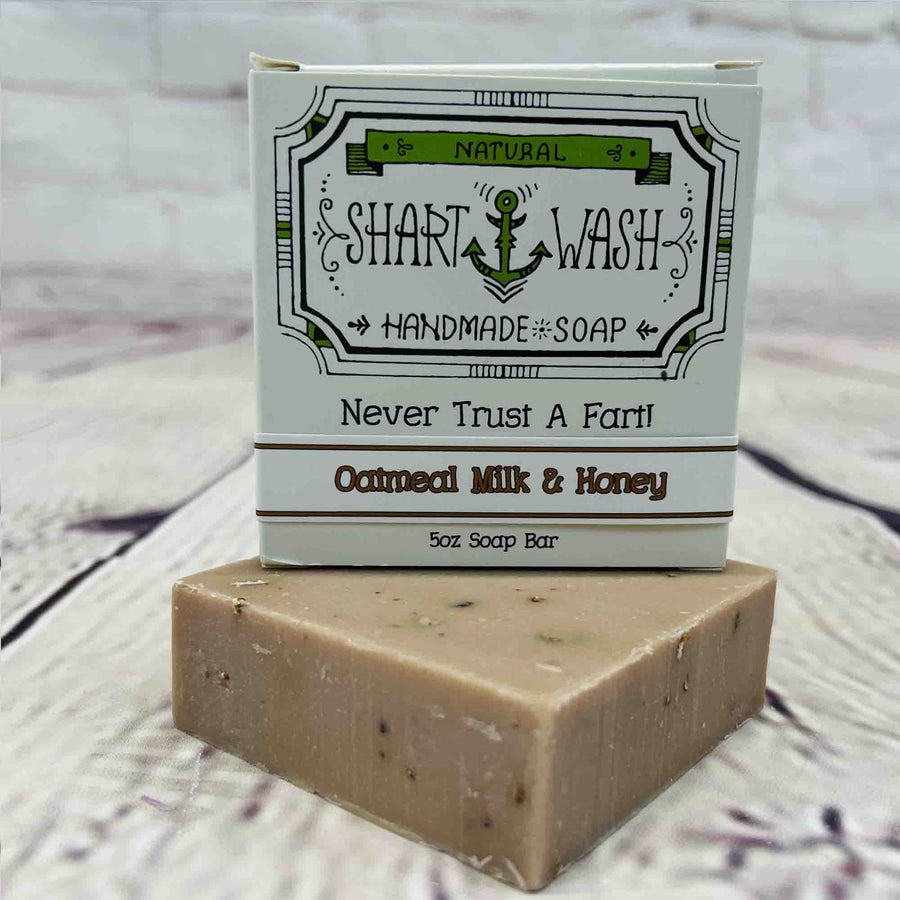 Picture of Shart Wash Handmade Soap Bars Oatmeal Milk & Honey Scent box on top of a tan bar of soap