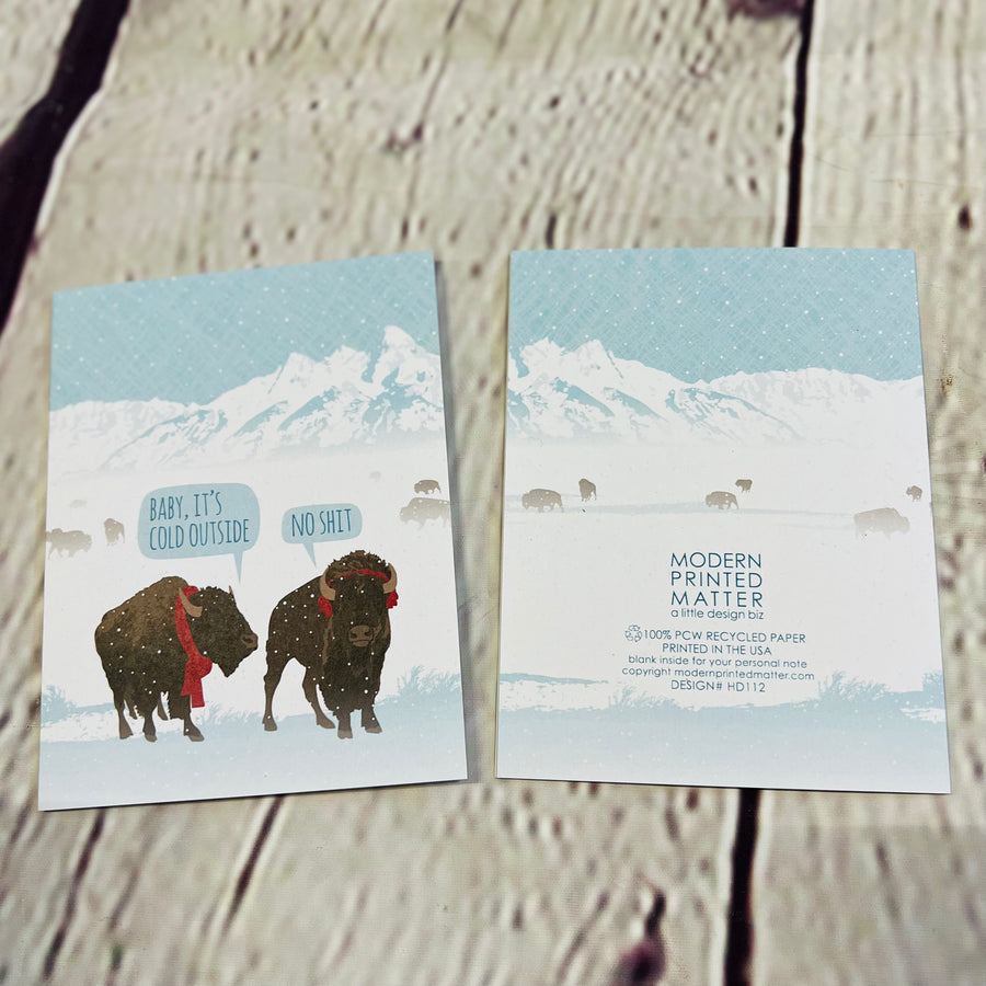 Card of two buffalo. One saying baby, it's cold outside. The other saying  'no shit.
