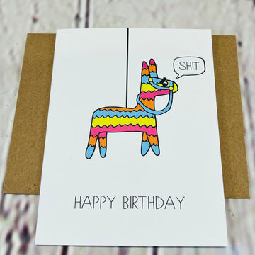 White card on a brown envelope. Card shows a rainbow pinata saying, 